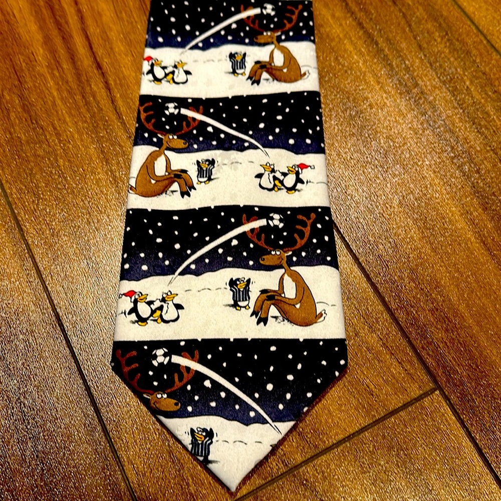 Winter themed Cartoon tie from the Jingle Bells company.